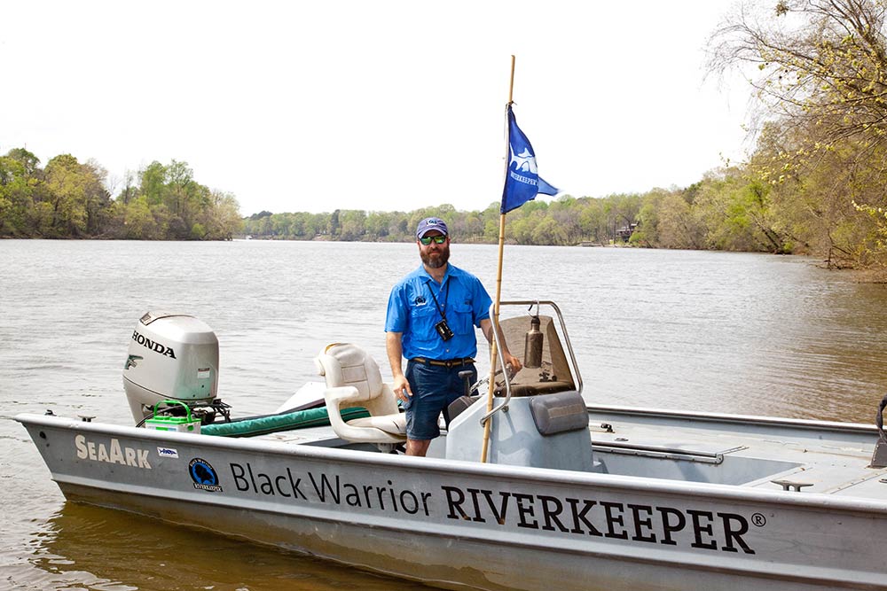 nelson brook in a black warrior riverkeeper patrol boat