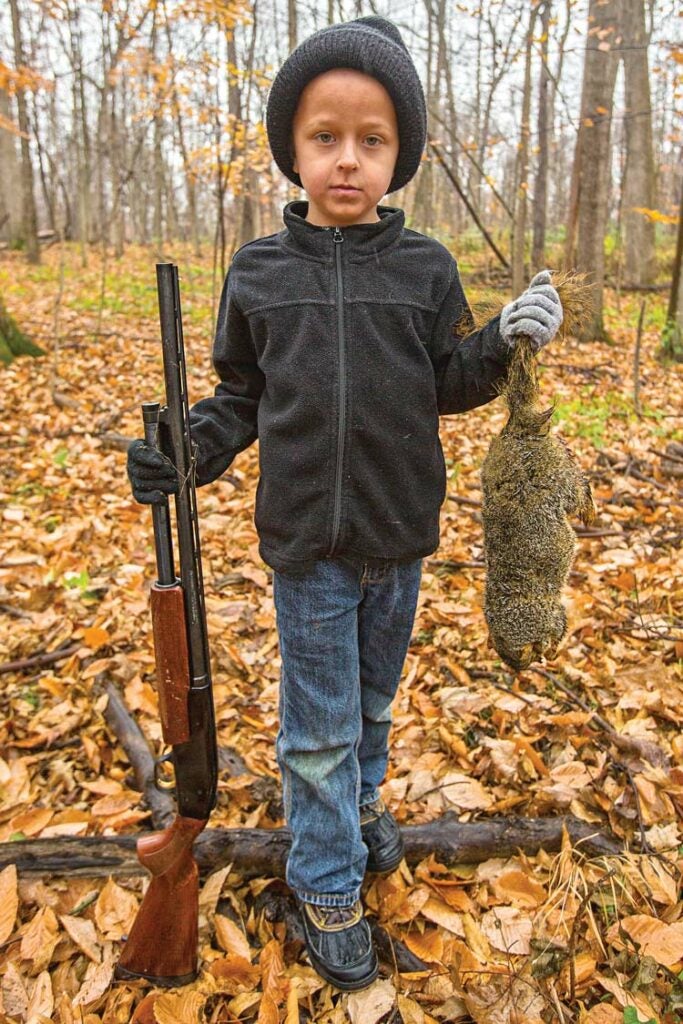 young child hunting fox squirrel