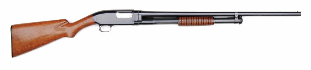 The Winchester Model 12 on a white background.