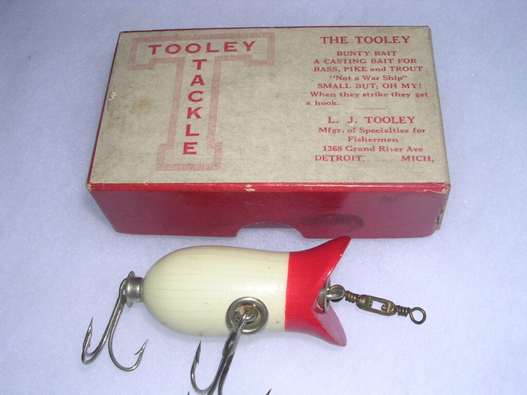 L.J. Tooley of Chicago was a world champion baitcaster who marketed lures in the early teens.