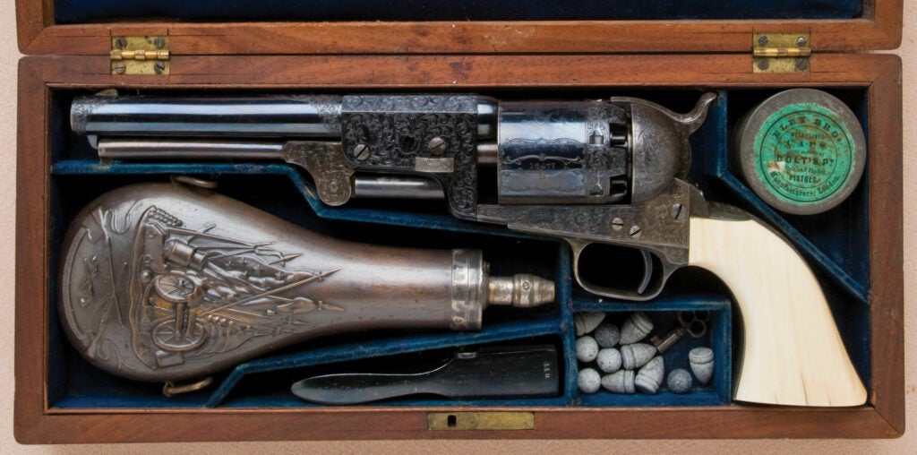 httpswww.fieldandstream.comsitesfieldandstream.comfilesimport2014importImage2011photo38356Historic_Cased_Gustave_Young-Engraved_and_Ivory-Gripped_Colt_Third_Model_Dragoon_Revolver_Inscribed_Colonel_P.M._Milliken_-_2.jpg