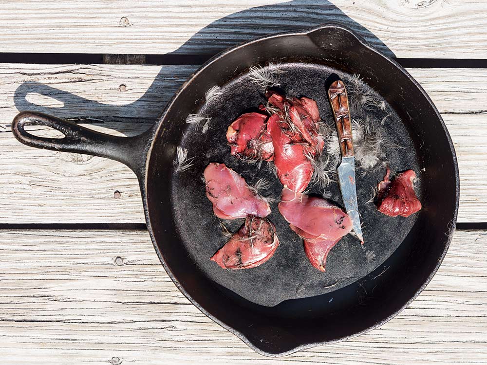 rail bird meat in a cast iron skillet