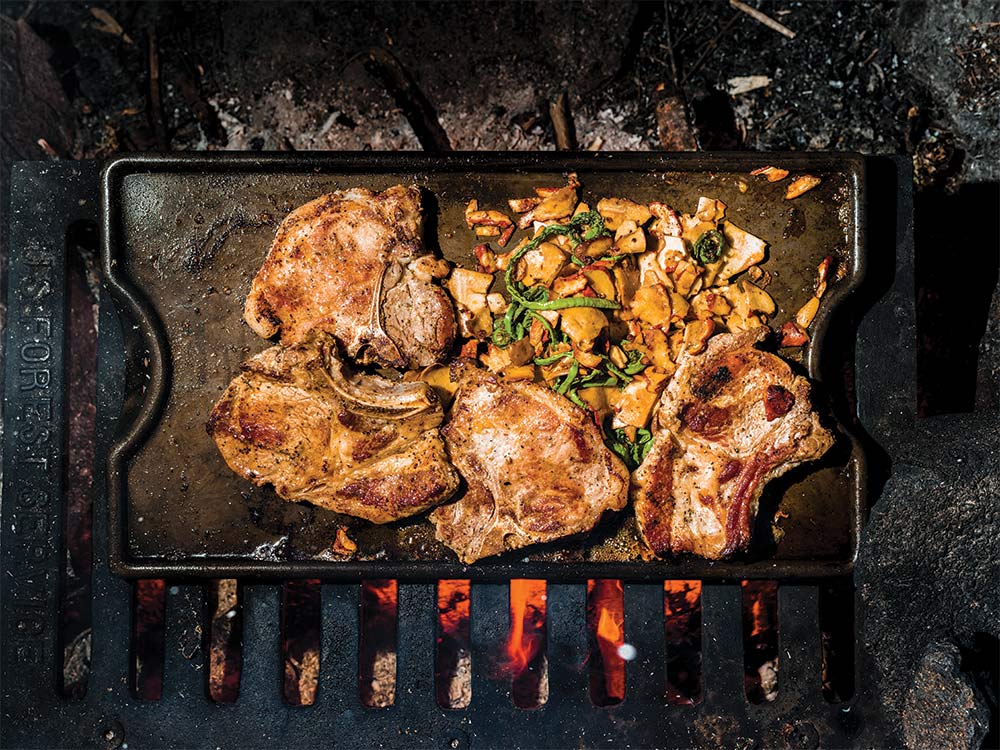 chops over campfire