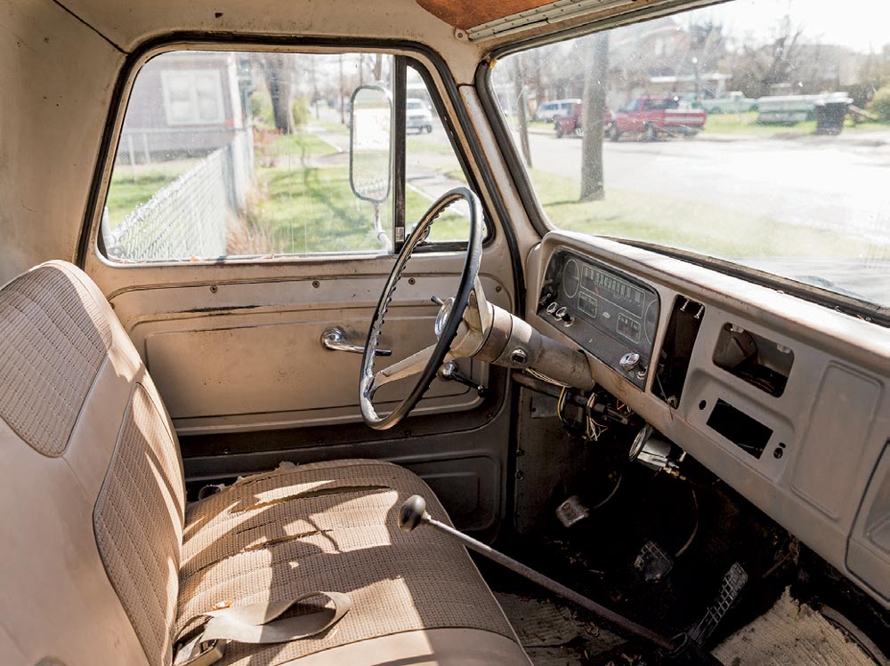 Inside of a truck with a stick shift