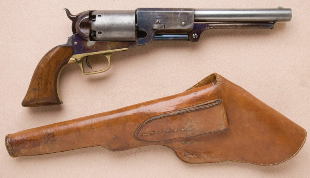 httpswww.fieldandstream.comsitesfieldandstream.comfilesimport2014importImage2011photo38356Fine_and_Exceptional_Colt_Walker_Model_Civilian_Series_Revolver_with_Period_Flap_Leather_Holster_Known_as_the_The_Thumbprint_Walker_-_1.jpg