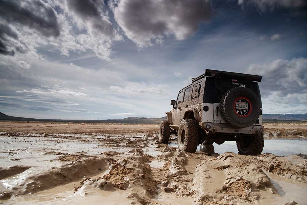 jeep riding through mud