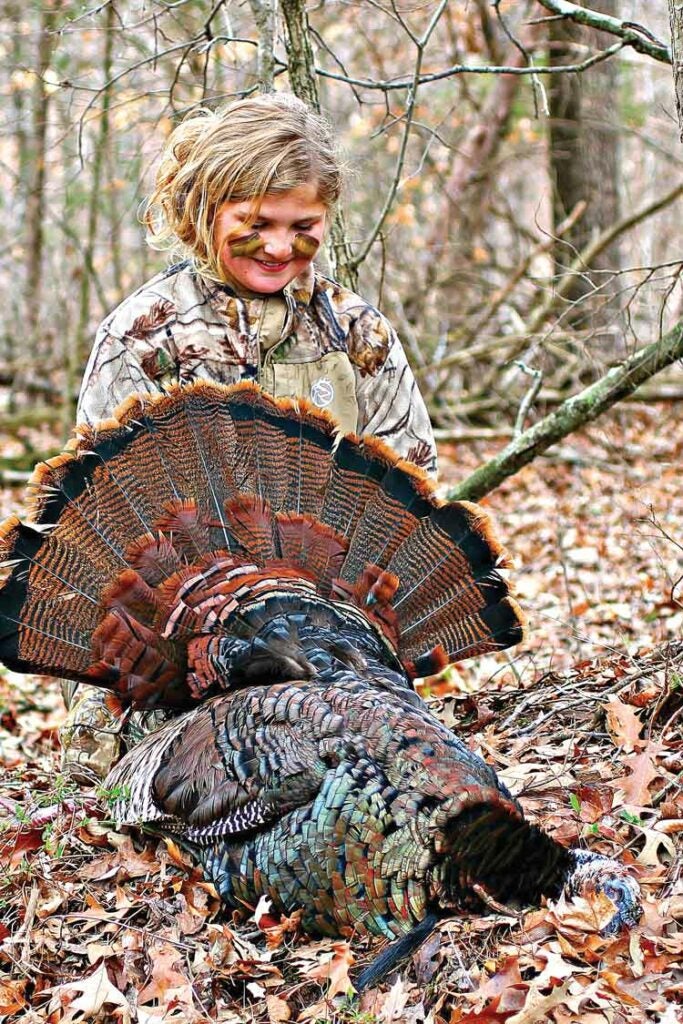 young girl turkey hunting