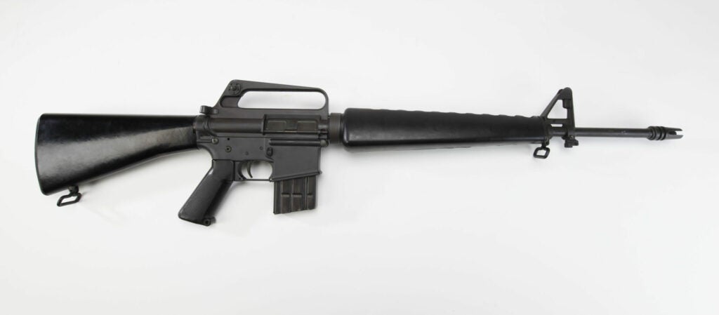 An AR-15 rifle on a white background.