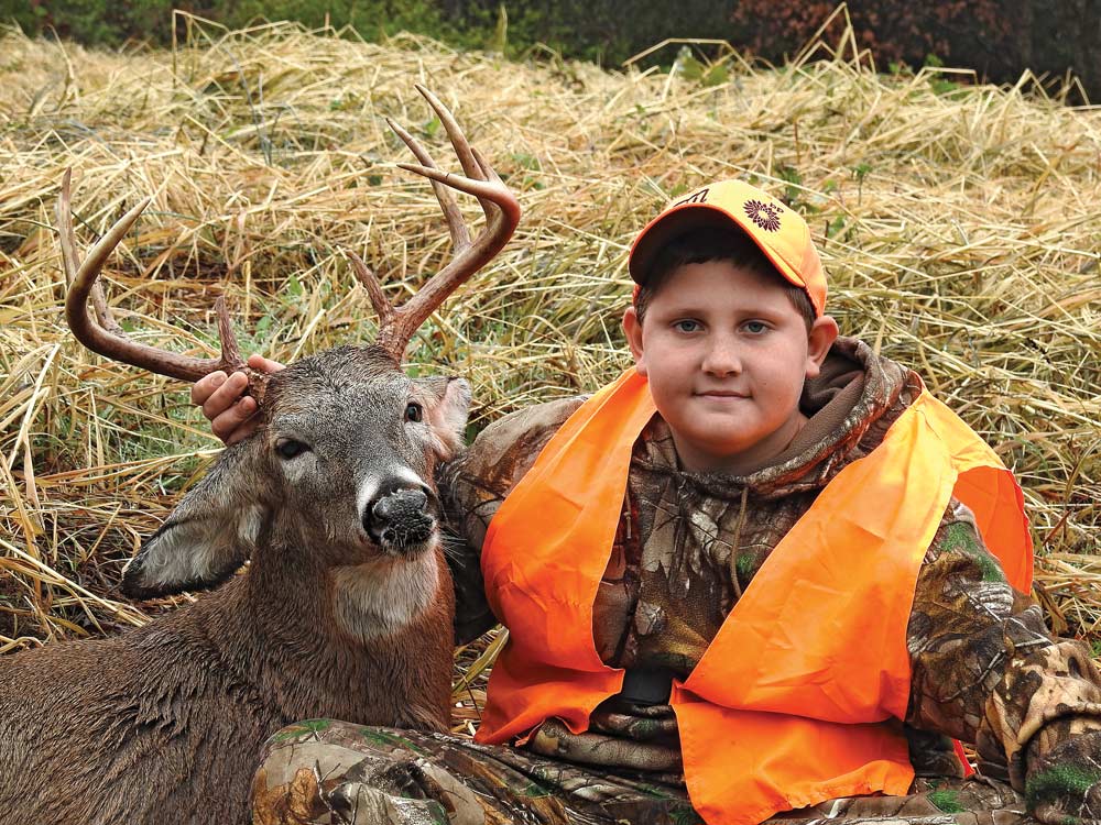 young boy whitetail hunting buck kentucky