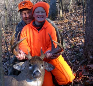 Austin Schwark, with his dad, Michael, downed this 14-pointer last November.