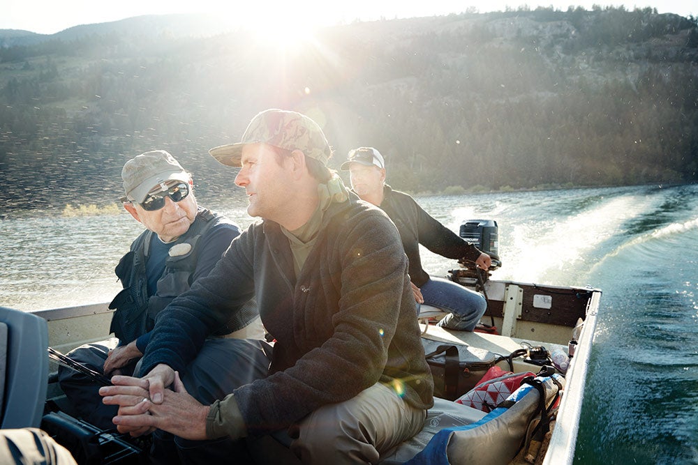 yvon chouinard and kenton carruth riding in boat