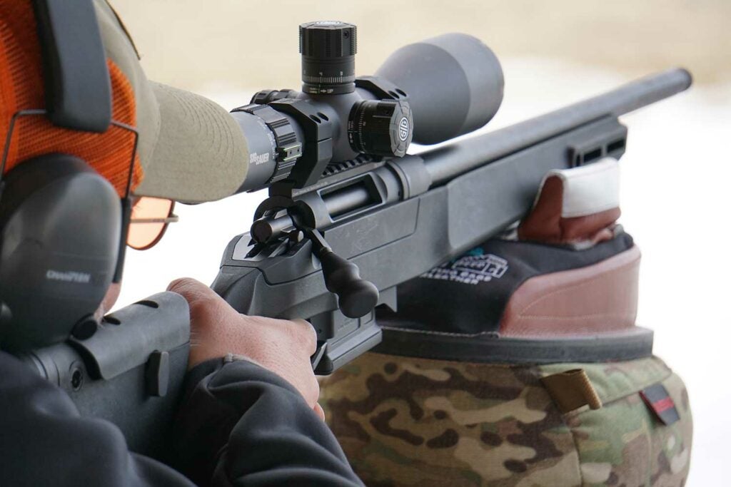 aiming a rifle using a shooting bag