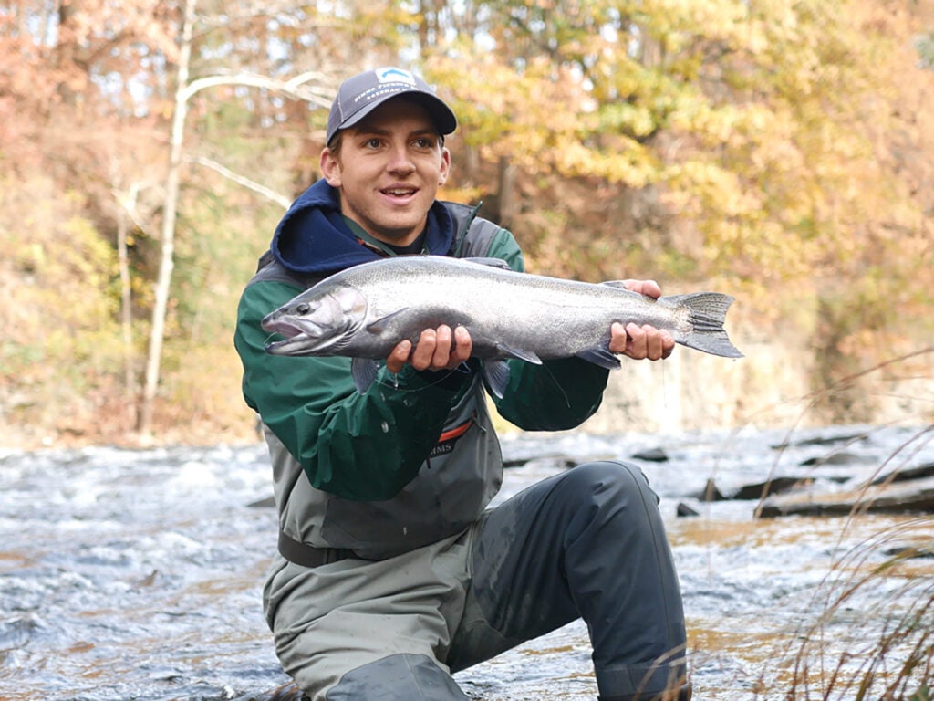Ryan Chelius holding steelhead fish