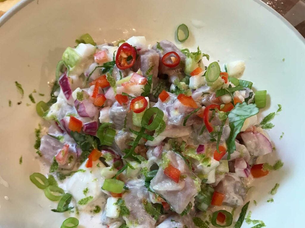 ceviche marinating in spices and herbs