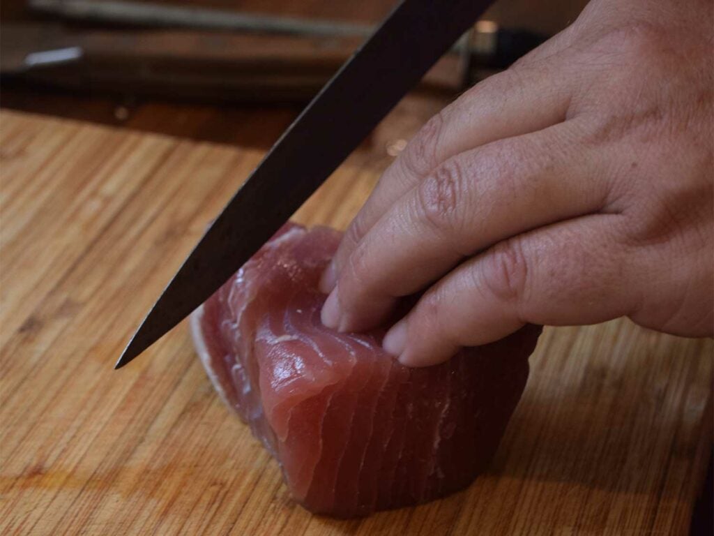 slicing blackened tuna sashimi