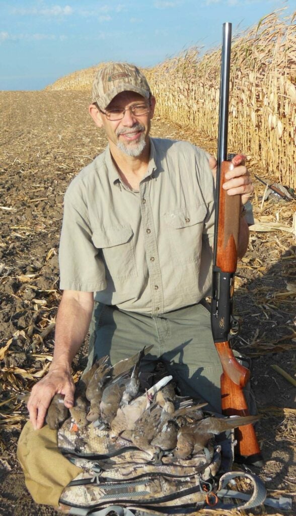 phil bourjaily holding a beretta 390 shotgun