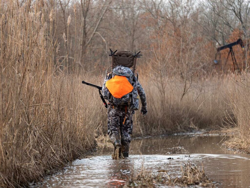 Sitka Gear pro Chris Derrick uses a prototype pack to carry a lightweight stand and sticks for late-season hang-and-hunt.