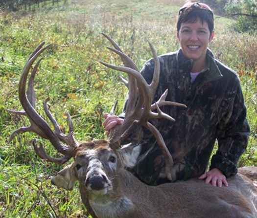 Hunter with a large trophy buck.