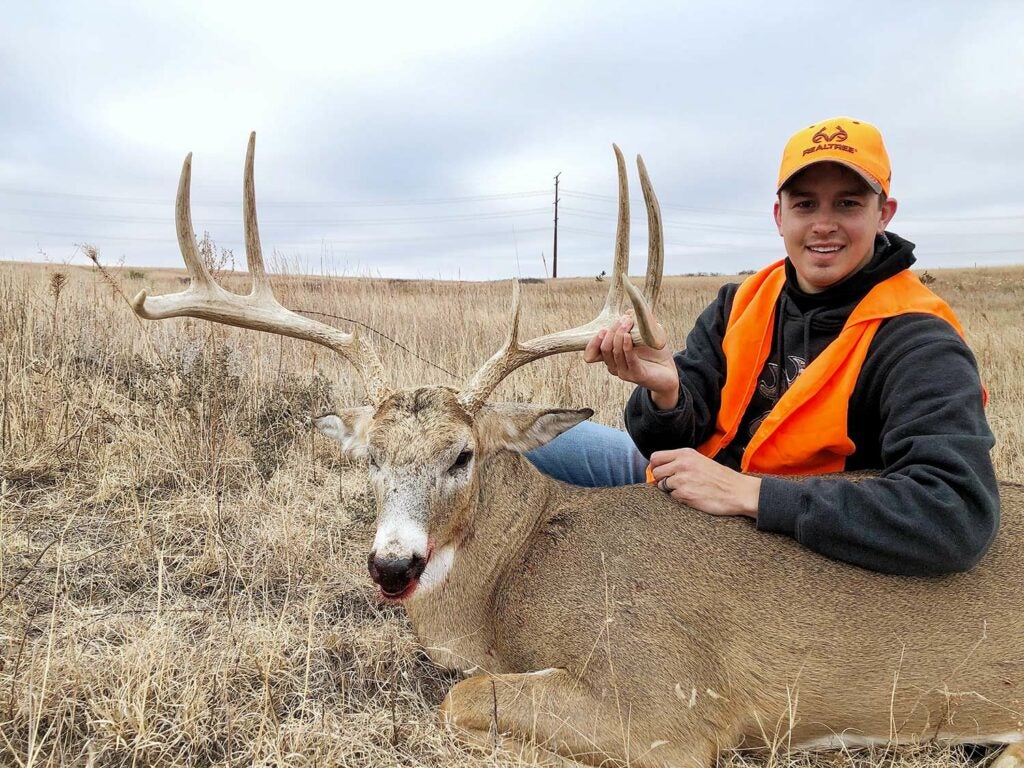 After tagging this buck, Garrett Colglazier received trail-cam pics of the deer from neighbors that live more than 3 miles away.