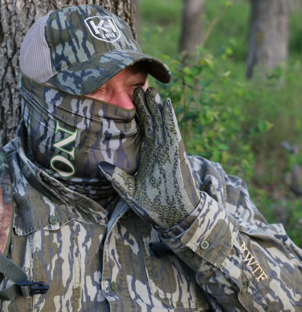 Hunter wearing camo hunting gear.