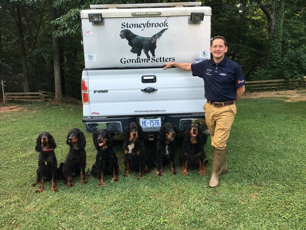 Stoneybrook Outfiiters Stephen Faust with hunting dogs.