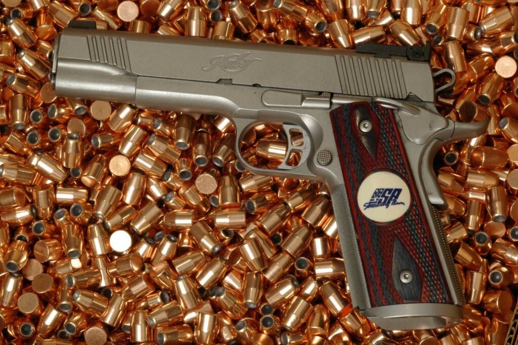 A handgun on an ammo reloading handgun.