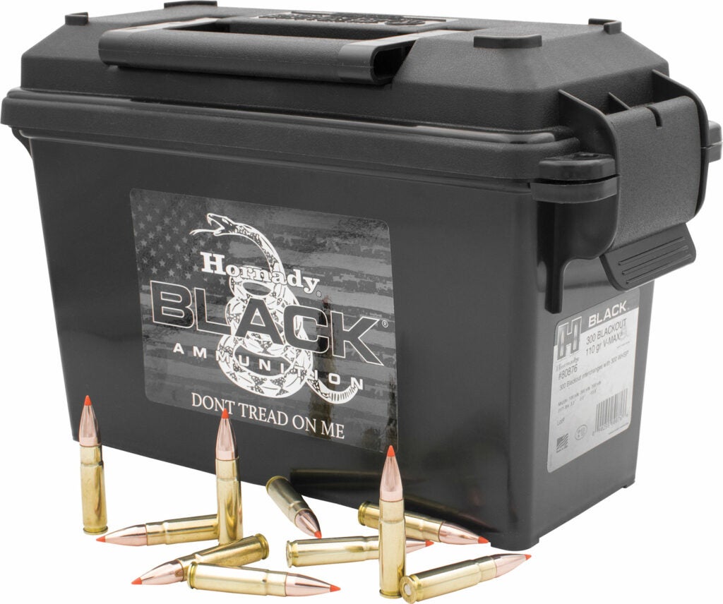 A plastic box of Hornady rifle ammunition.