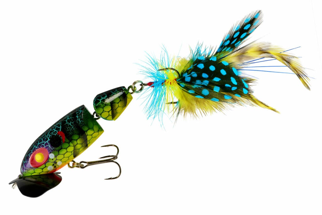 A segmented blue, yellow and green fishing lure.