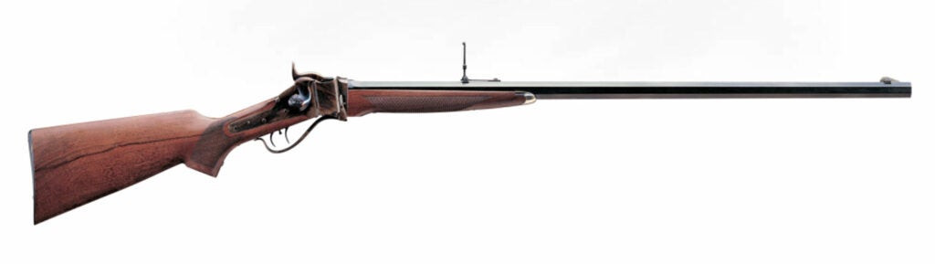 A brown and black Uberti rifle on a white background.