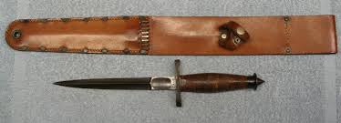 A v42 combat knife and a leather sheathe.