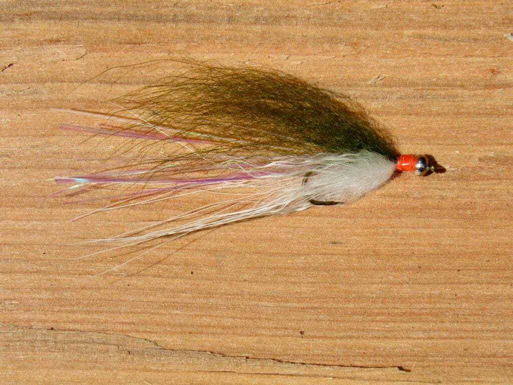 The Little Precious fly lure on a table.
