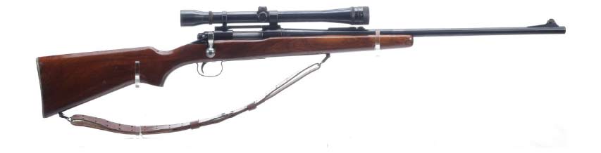 A vintage model 722 rifle on a white background.