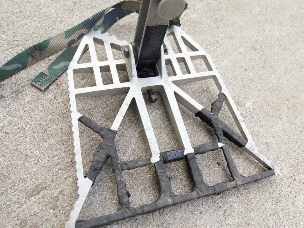 A deer tree hunting stand covered in tape.