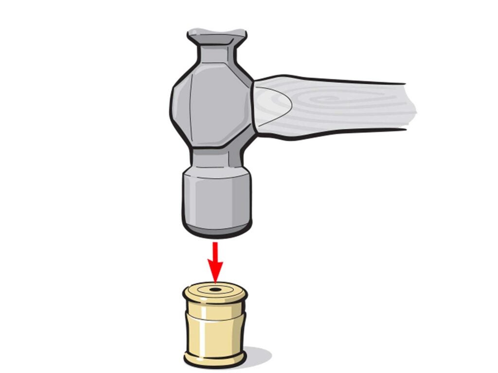 Illustration: Tap the brass head with a hammer to widen the circumference.