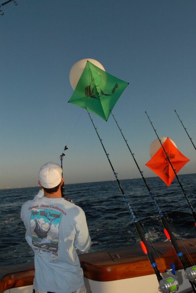 Dangling live baits from kites is a great way to tease a sailfish into chewing.