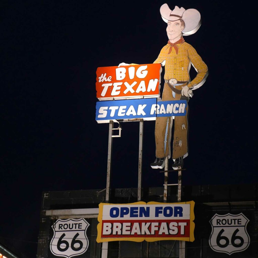 A Big Texan Steak Ranch sign outside a restaurant on Route 66